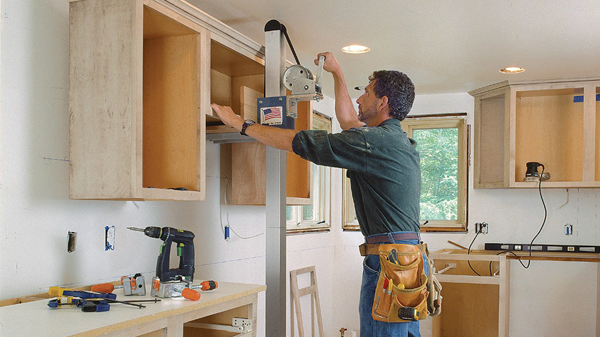 Attaching kitchen cabinets to wall